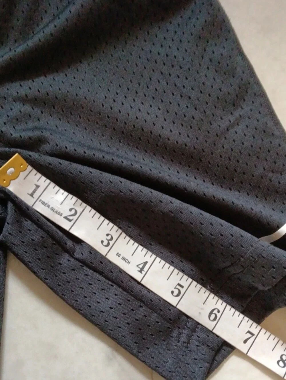 Nike Black Kids Mesh Athletic Shorts with White Swoosh